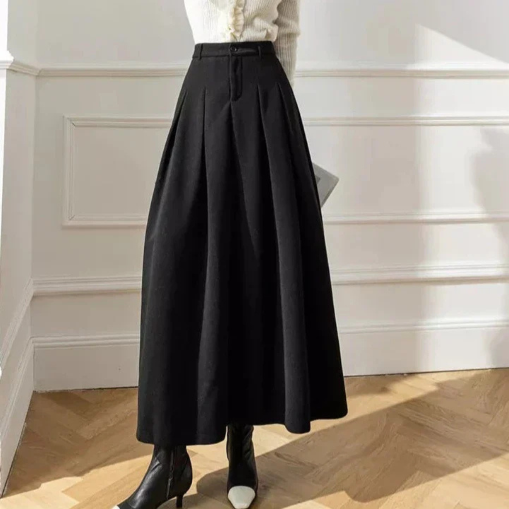 Elegante zwarte dames midi rok, ideaal voor zakelijk of casual chic. Stijlvol en comfortabel.
