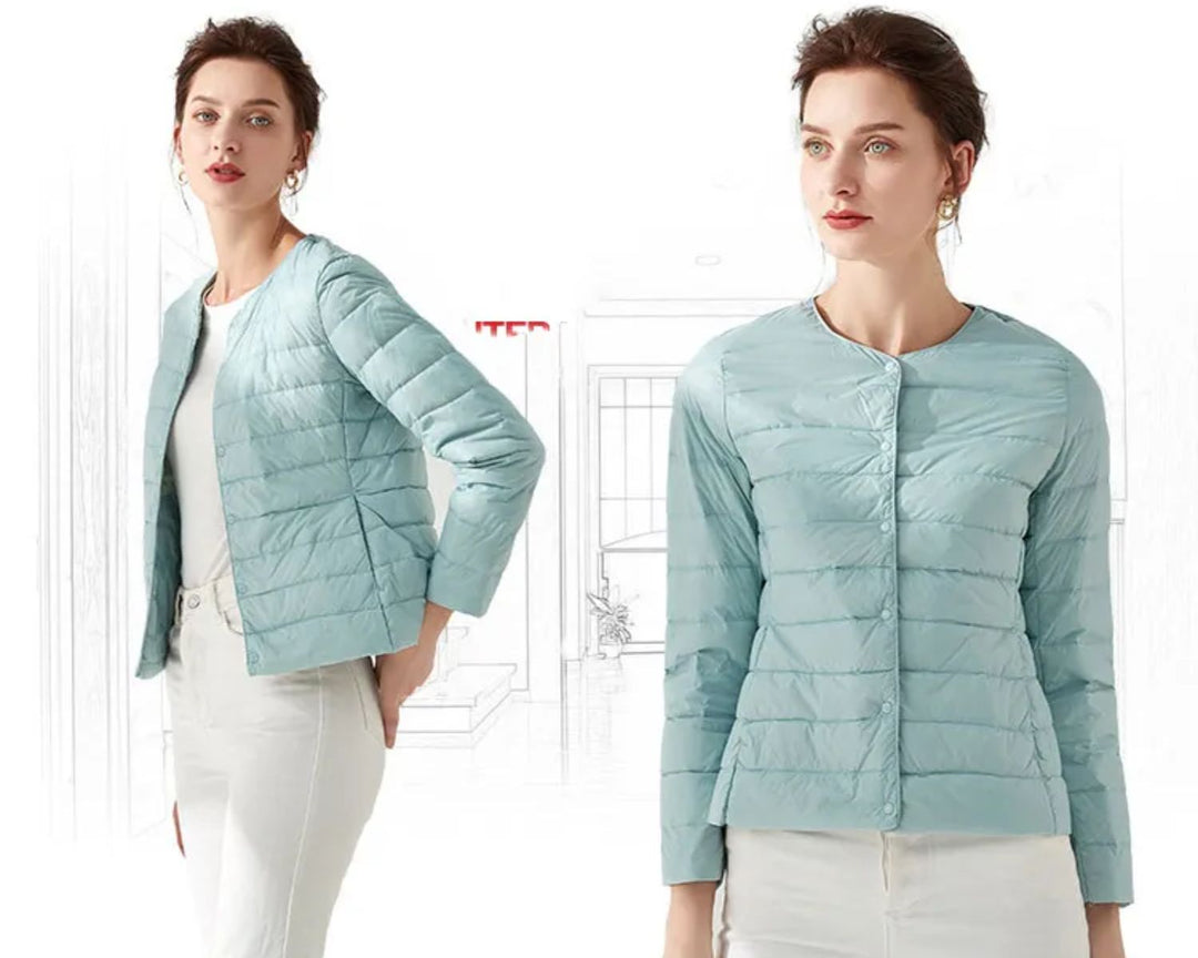 Elegant getailleerd dames donsjack, warm en stijlvol. Perfecte winterjas voor een modieuze look.