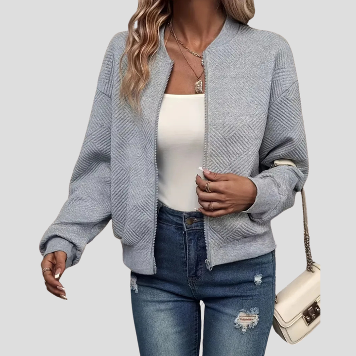 Elegant gebreid damesvest met lange mouwen, open vallend. Perfecte veelzijdige cardigan voor casual en chique looks.