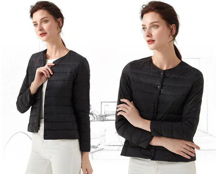 Zwart kort dames donsjack, lichtgewicht en warm. Essentiële winterjas, perfect voor casual mode.
