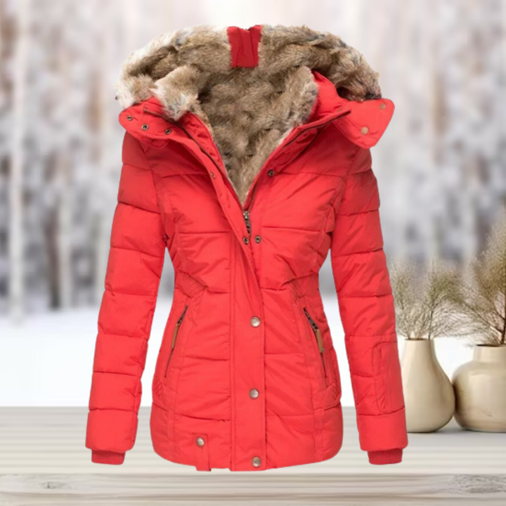 Stijlvolle dames pufferjas met een slanke pasvorm, ideaal voor een elegante en comfortabele winterlook.