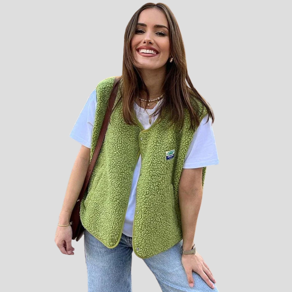 Stijlvolle groene dames wollen bodywarmer. Comfortabel mouwloos vest voor warme, modieuze laagjes kleding.