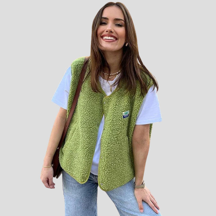 Stijlvolle groene dames wollen bodywarmer. Comfortabel mouwloos vest voor warme, modieuze laagjes kleding.
