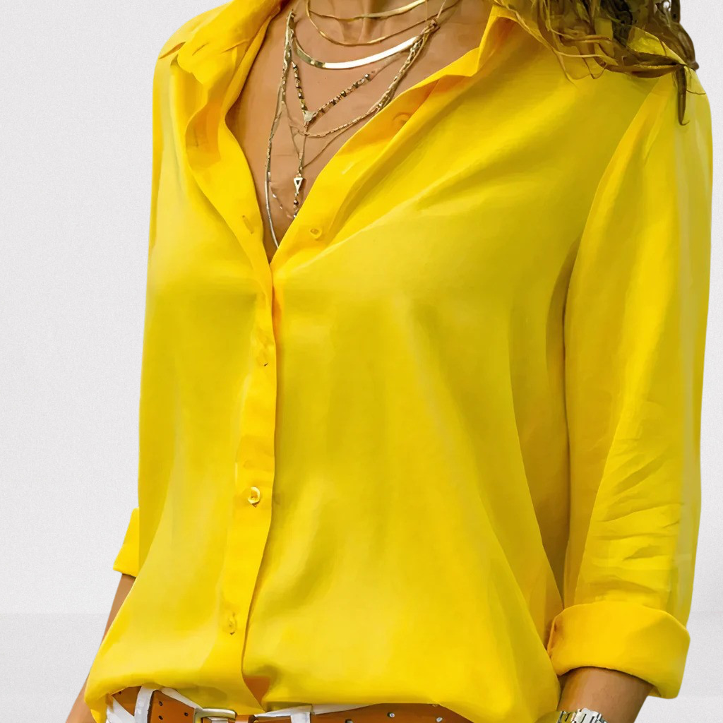 Modieuze Hoymans damesblouse met lange mouwen, perfect voor casual chic of feestelijk.