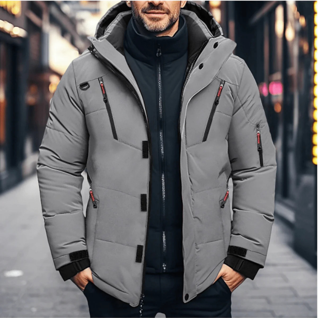Detail van de waterafstotende stof van de warme heren winterjas met comfortabele capuchon en rits.
