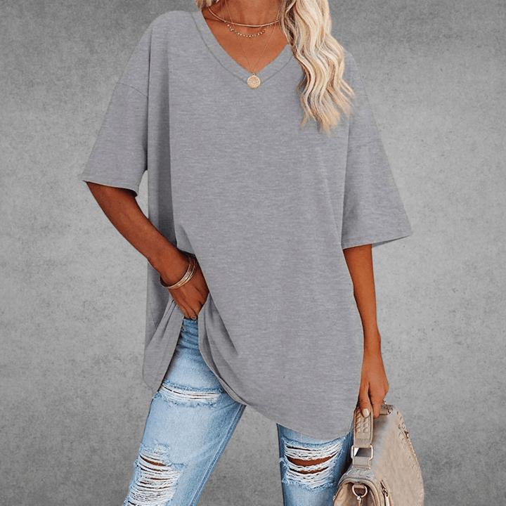 Comfortabel en modieus: oversized dames V-hals T-shirt, perfect voor casual lente/zomer. Relaxte, veelzijdige pasvorm.