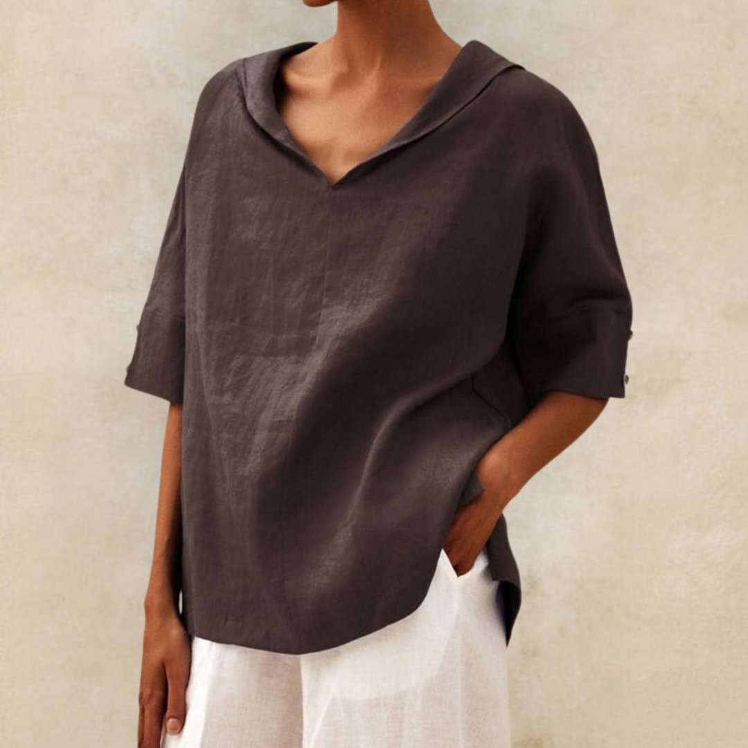 Stijlvol dames V-hals overhemd met losse pasvorm. Ideaal voor een relaxte, luchtige look. Comfortabel damesshirt.