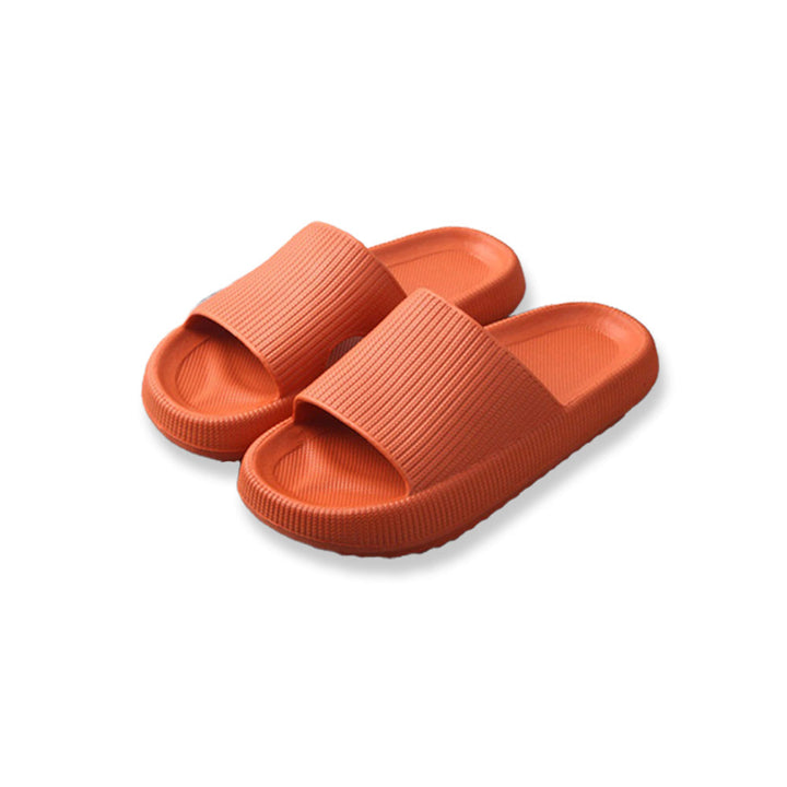 Detailfoto van de dikke zool van unisex wolkenslippers, toont het zachte en dempende EVA-materiaal.