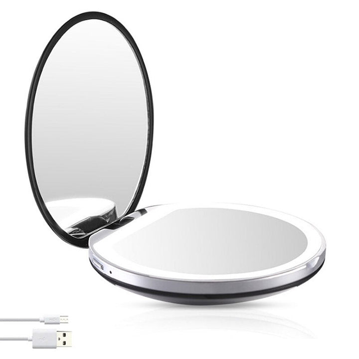 Elegante zwarte compacte LED schoonheidsspiegel, oplaadbaar en ideaal voor reizen.