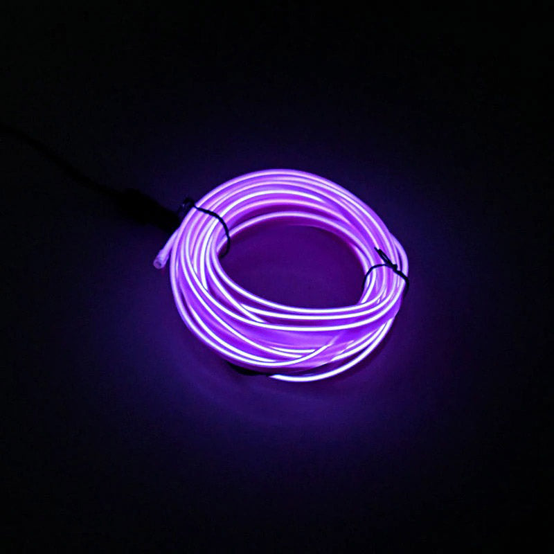 Auto interieur met brandende neon LED verlichting overdag, toont helderheid en installatie.
