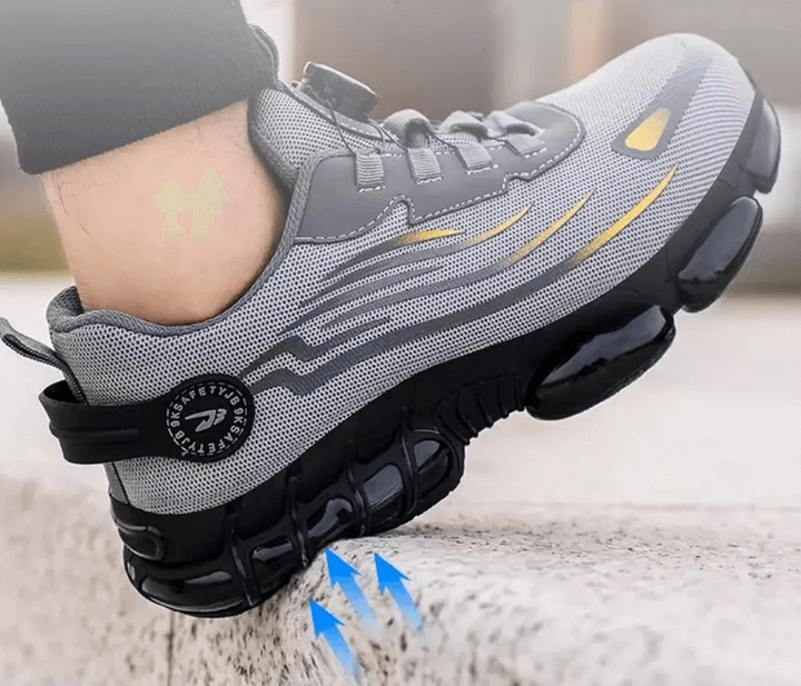 Grijze/zwarte veiligheidsschoenen heren met draaisluiting, lichtgewicht, antislip en comfortabel voor lange werkdagen.