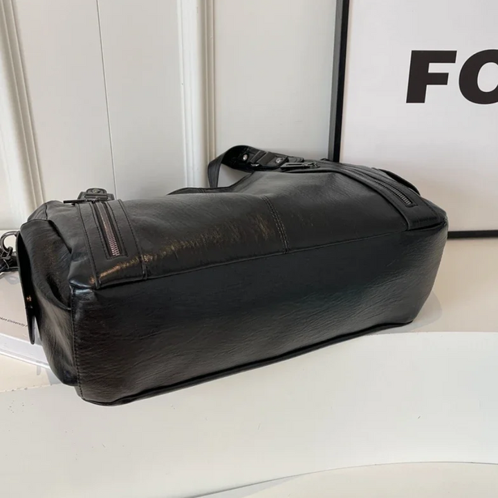 Dames tas Nikita, een praktische en georganiseerde schoudertas, perfect als crossbody.