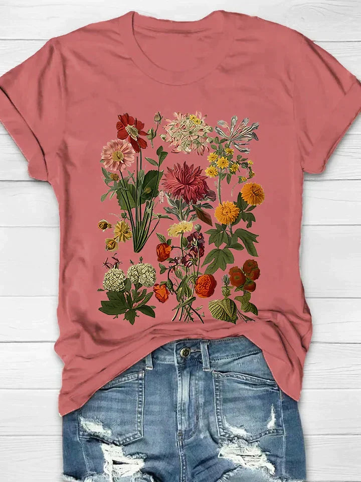 Comfortabel dames shirt met bloemenprint, ronde hals en korte mouwen, stijlvolle vintage kleding voor de zomer.