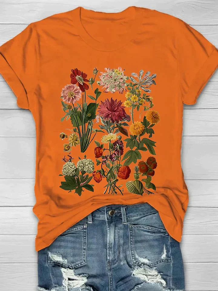Dames vintage shirt met unieke bloemenprint, elegante zomerse top met ronde hals, comfortabele korte mouwen.