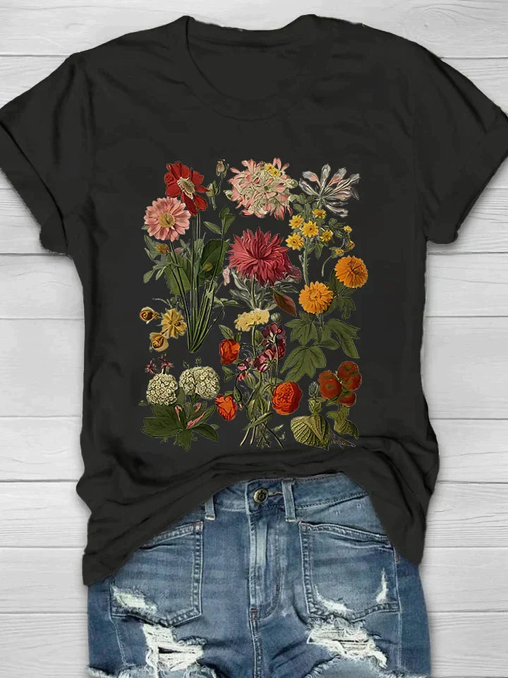 Dames vintage shirt met vrolijke bloemenprint, elegant en comfortabel, perfecte zomerse top met ronde hals.