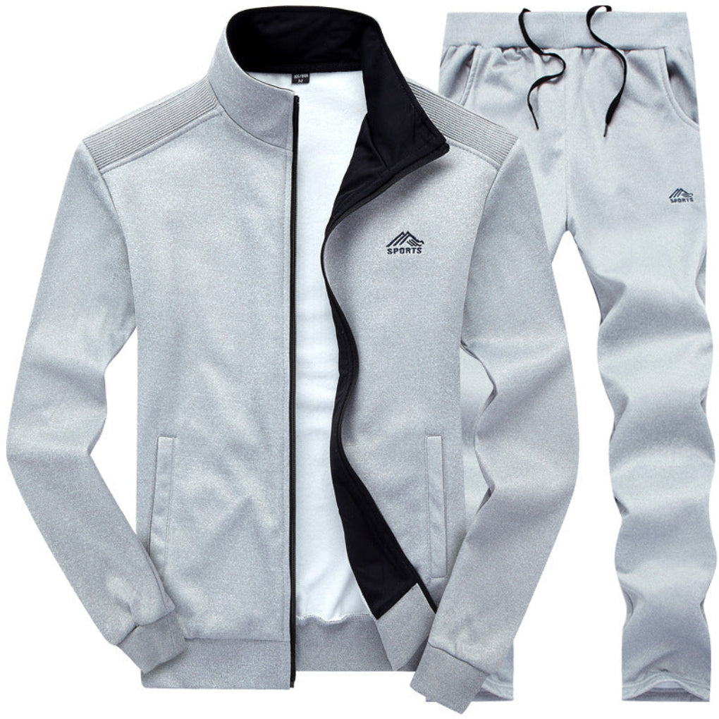 Stijlvol grijs heren joggingpak met zwarte accenten, comfortabel voor vrijetijdskleding en sportieve outfits.