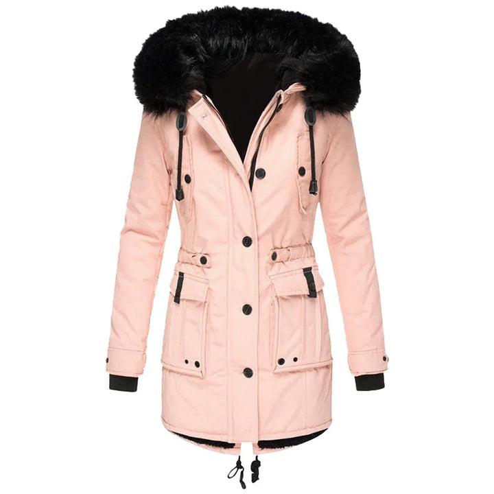 Gewatteerde dames winterjas met lange snit en capuchon. Perfecte outdoor kleding voor warmte en stijl.
