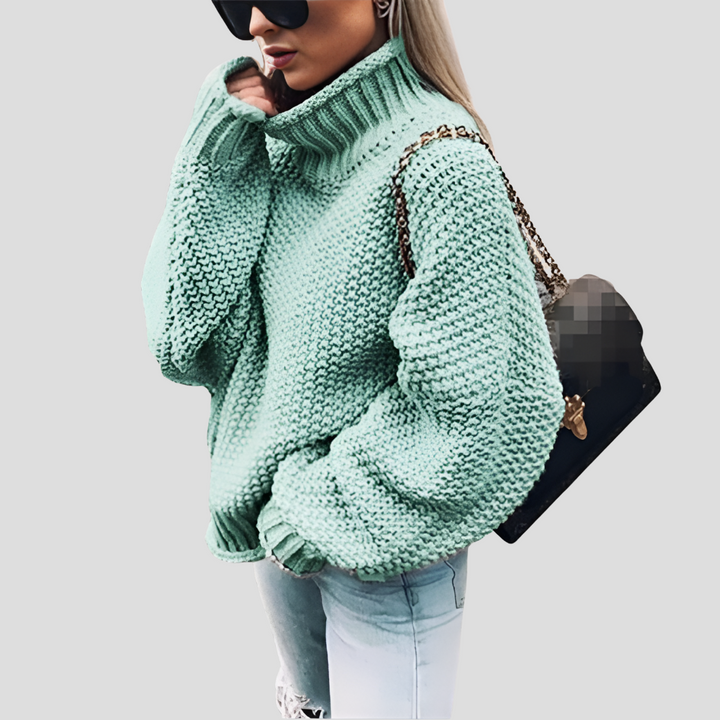Trendy warme damestrui met hoge col, ideaal als comfortabele gebreide winterkleding. Losvallend en stijlvol.