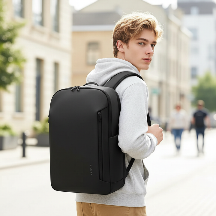 Waterdichte grijze zakelijke rugzak met laptopvak; perfect voor werk, school & reizen.