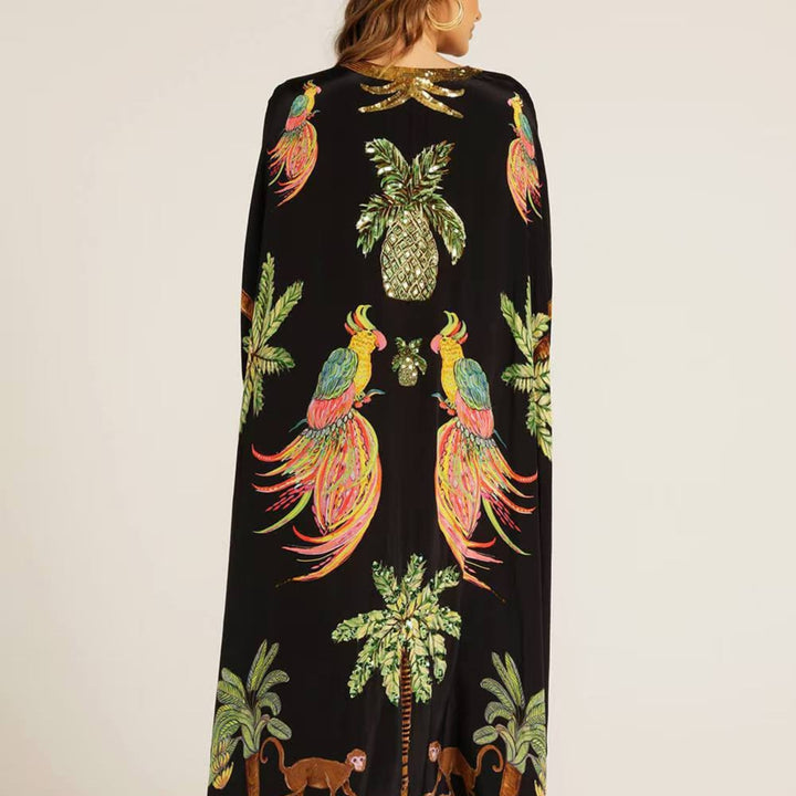 Enkellange dames kaftan, model Addison, met kleurrijke tropische bladeren print. Zomerjurk essentieel.
