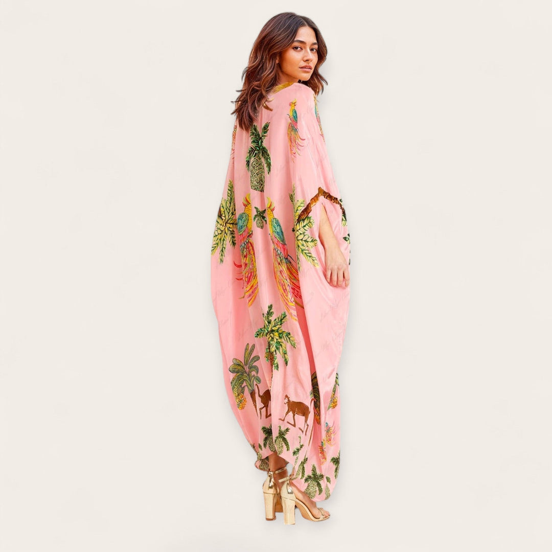 Elegante losse dames kaftan met tropische print, ideaal als comfortabele zomerjurk.