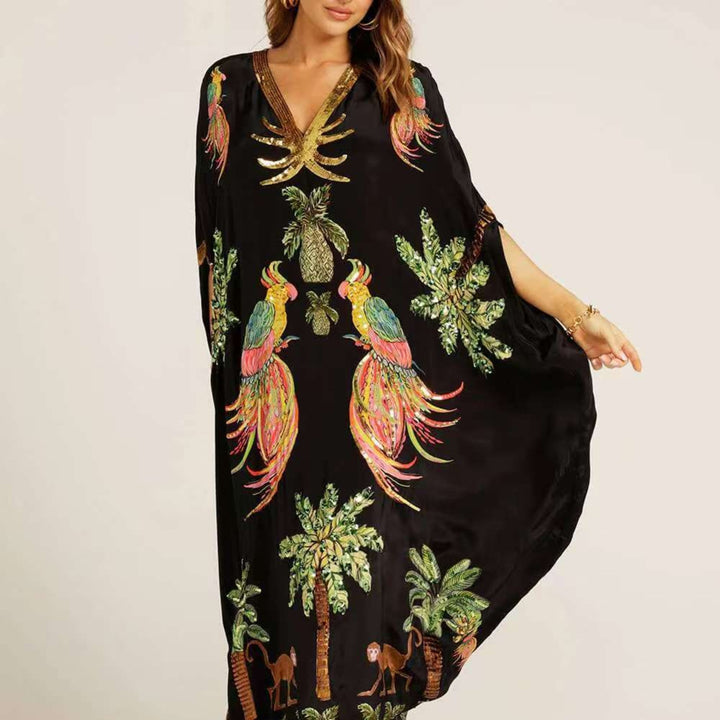 Luchtige dames kaftan met tropische print, losvallend, ideaal voor warme zomerdagen.