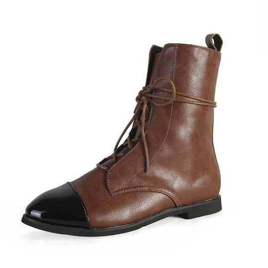 Veelzijdige zwarte leren dames enkellaarsjes met veters. Perfecte combinatie van comfort en mode voor elke gelegenheid.