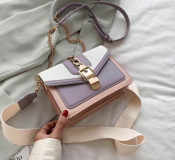 Veelzijdige zwarte PU leren dames sling bag, schoudertas met kettingdetails voor dagelijks gebruik.