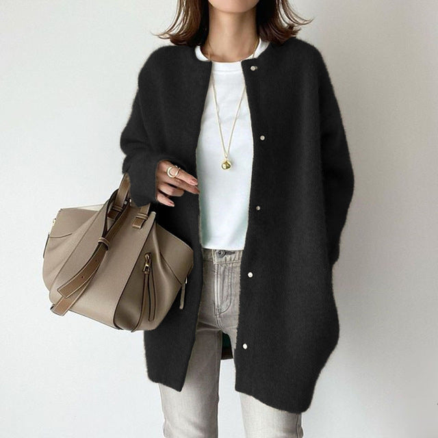 Chique oversized damesvest, knitwear met lange mouwen en losse pasvorm. Comfortabel en stijlvol voor diverse gelegenheden.