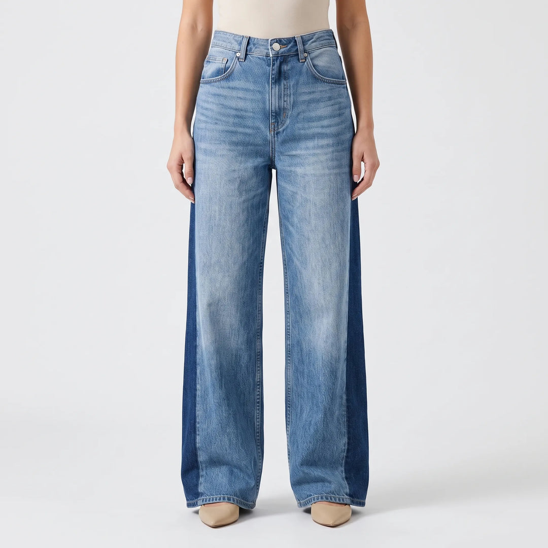 Trendy dames wijde pijpen jeans met hoge taille en uniek tweekleurig design. Perfect voor modebewuste vrouwen.