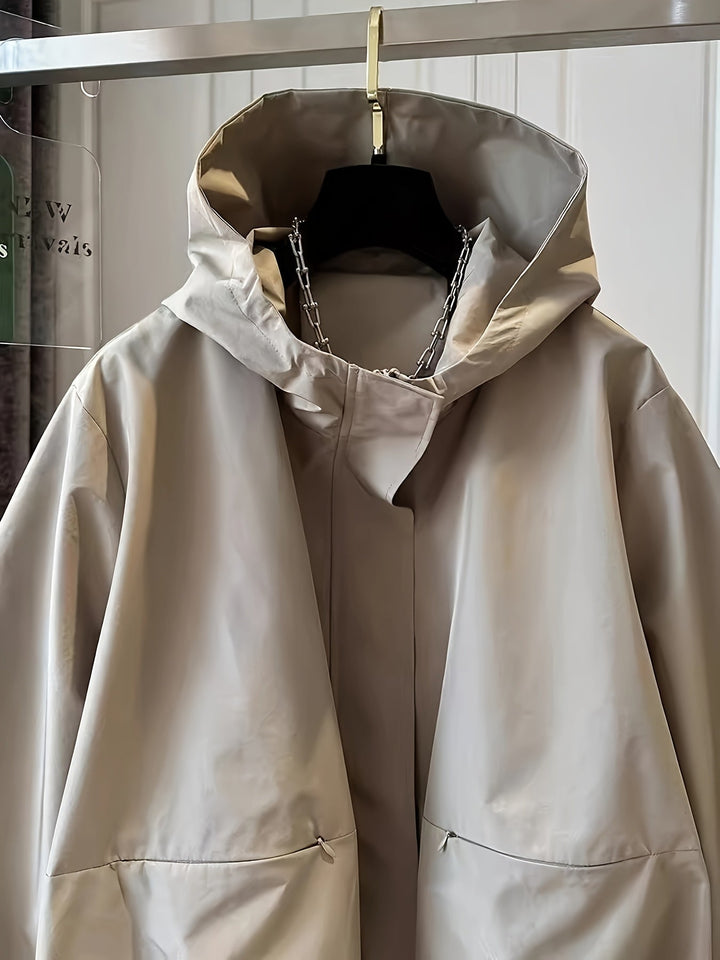 Dit lichtgewicht dames windjack met capuchon is de perfecte aanvulling op je voorjaarsgarderobe.
