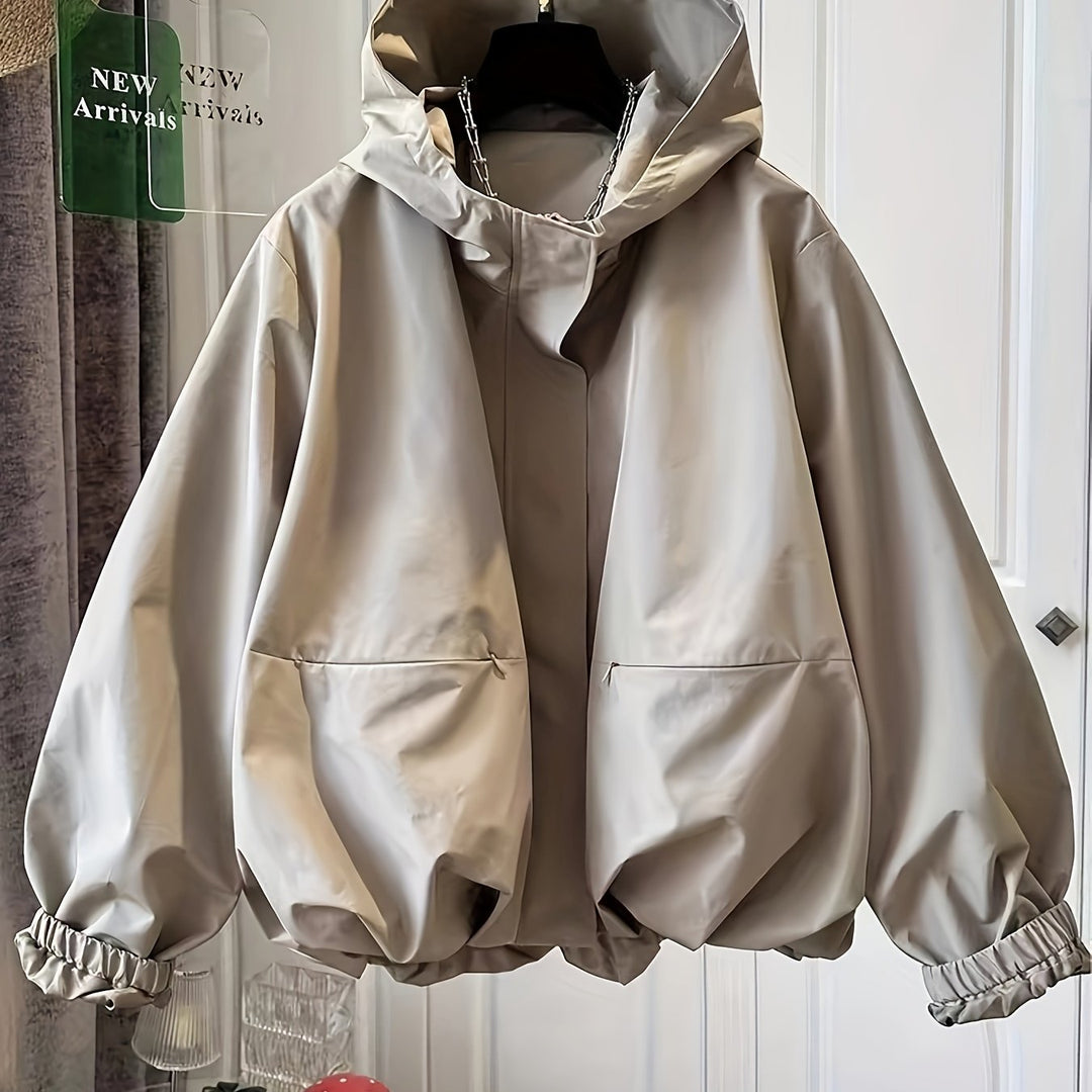 Modern oversized dames windjack met capuchon, perfect voor streetwear en alledaags comfort.