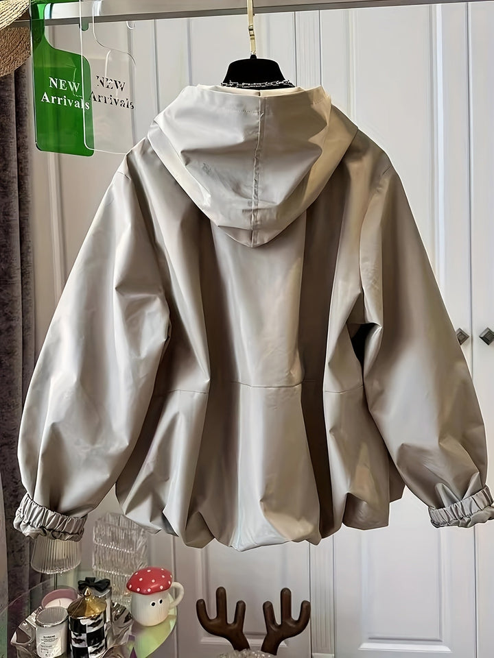 Dames windjack met capuchon, perfect voor het voorjaar. Ademend en lichtgewicht voor alledaags comfort.