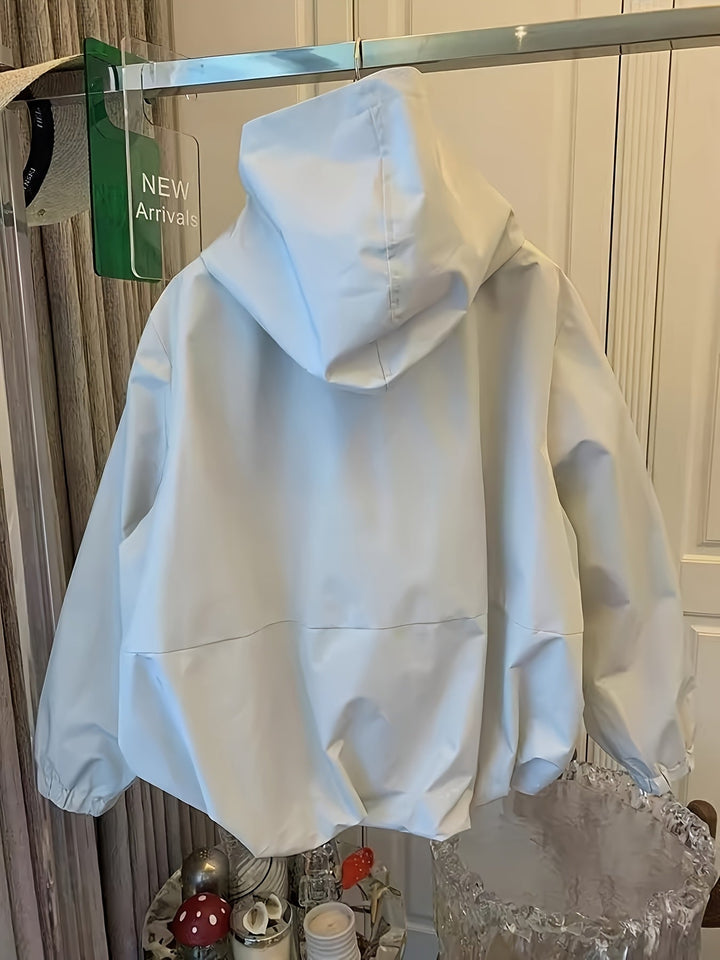Comfortabel dames windjack met capuchon, geschikt voor zowel sportief als casual gebruik. Trendy en modern.