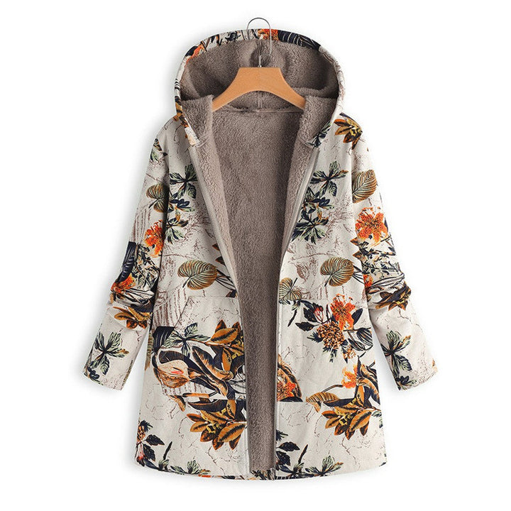 Trendy vintage damesjas met levendige bloemenprint, praktische zakken en modieuze uitstraling.
