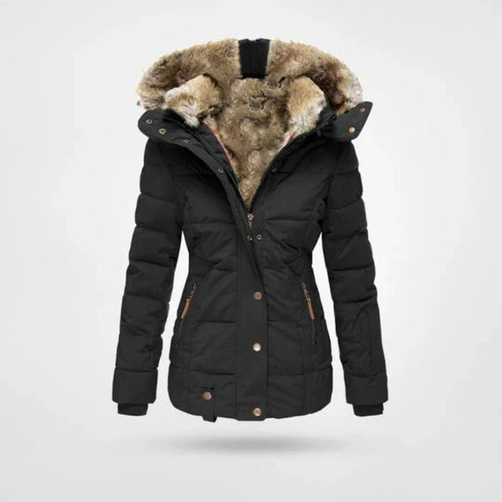 Dames winterjas met gevoerde capuchon en dubbele sluiting, warm en stijlvol voor koude dagen.