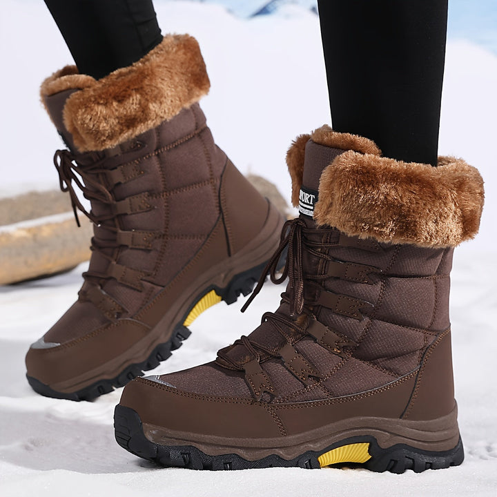 Warme dames sneeuwlaarzen in beige, met antislip zool voor veiligheid en comfort in de sneeuw.