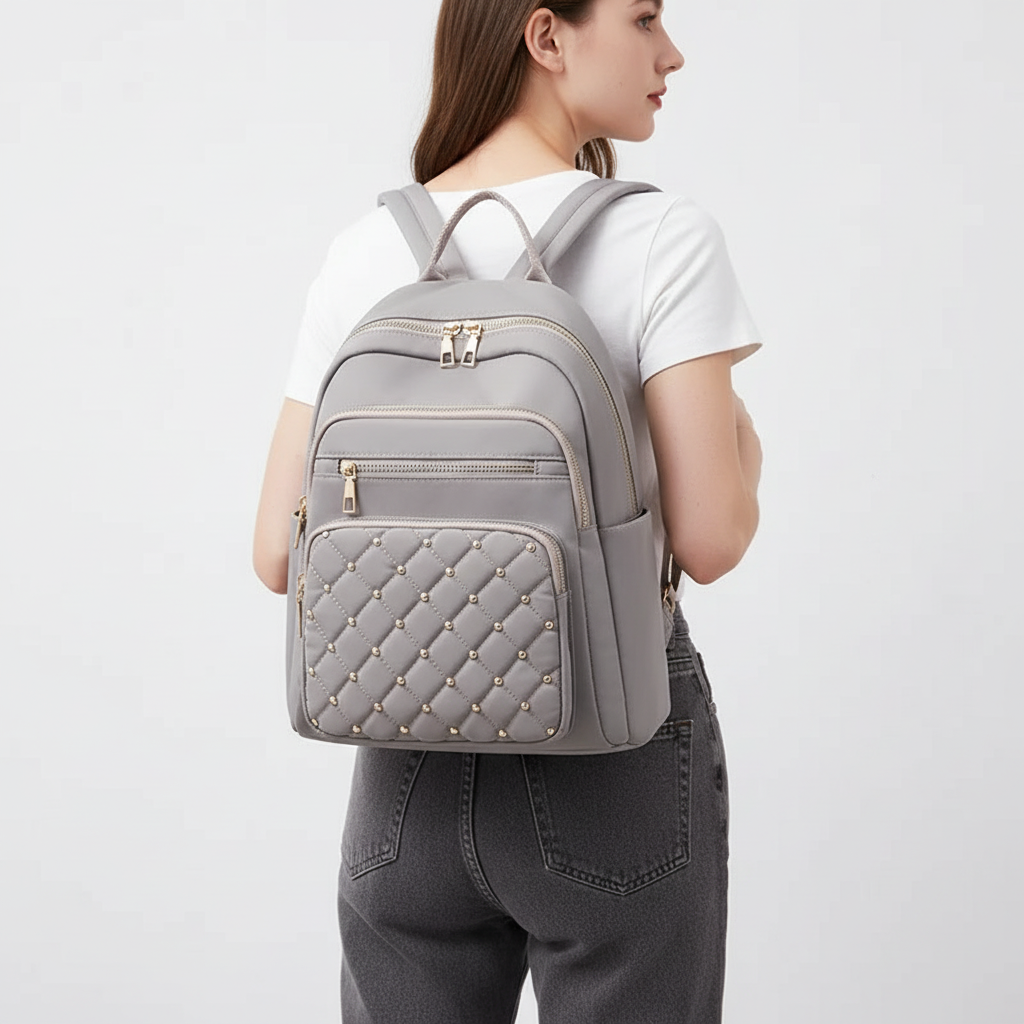 Praktische waterdichte dames schoudertas met ruim laptopvak, gemaakt van duurzaam nylon voor dagelijks gebruik.
