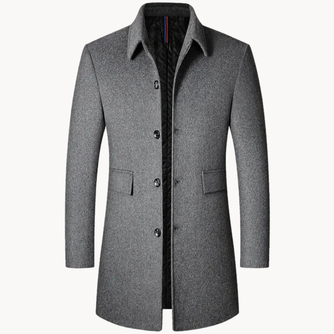 Elegante grijze wollen heren winterjas met opstaande kraag; comfortabele smart casual bovenkleding voor koude dagen.