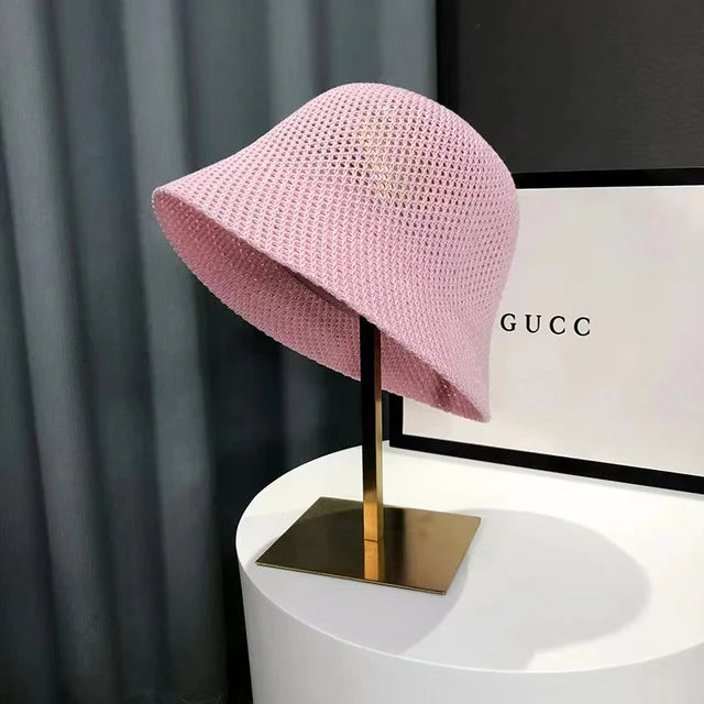 Compacte opvouwbare zonnehoed voor dames, lichtgewicht en UV-werend, ideaal voor buiten.