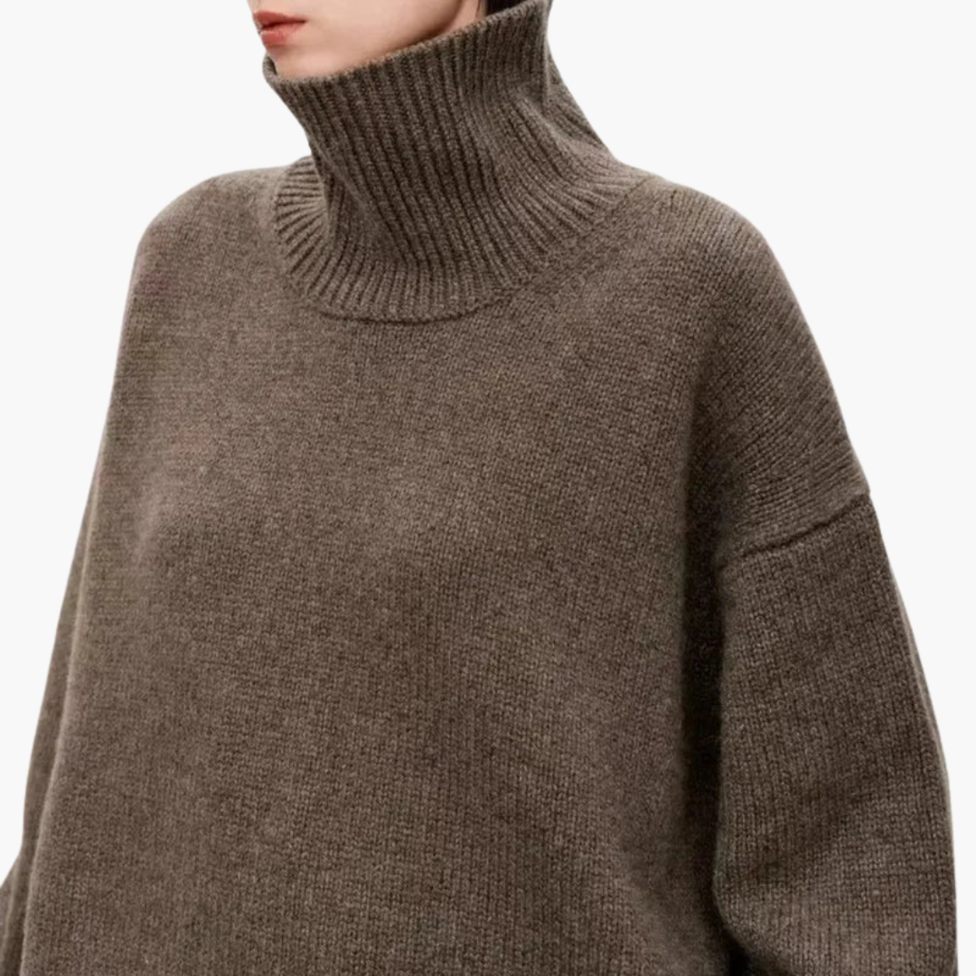 Fashion-forward dames trui: oversized pasvorm, hoge hals. Stijlvol en comfortabel voor elke gelegenheid.