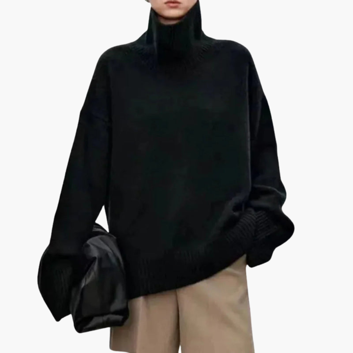 Dames oversized trui met hoge hals, gebreid voor comfort en stijl. Perfect voor winter of herfst.