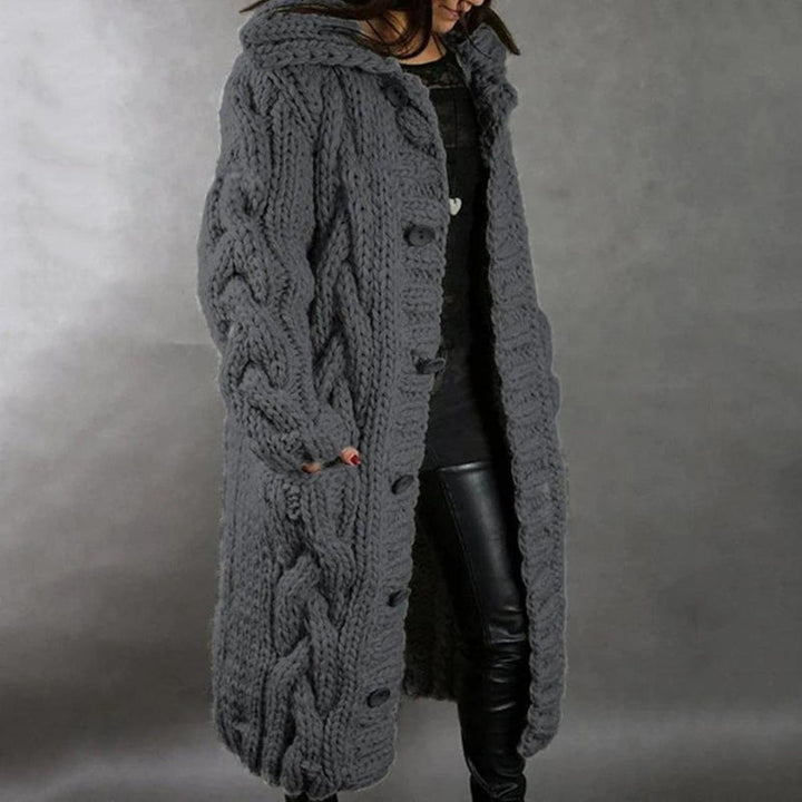 Trendy blauwe gebreide damesjas met lange mouwen. Perfect voor laagjes en een comfortabele, casual look.