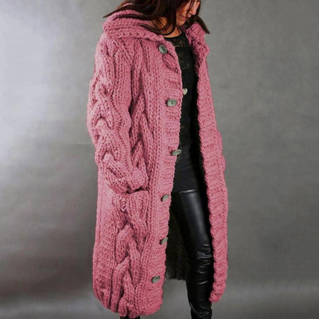 Zachte gebreide damesjas met lange mouwen in roze. Comfortabel en warm, ideaal voor elk seizoen.