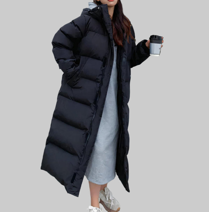 Comfortabele dames parka in zwart, lange pasvorm. Waterdichte winddichte winterjas voor optimale bescherming tegen kou.