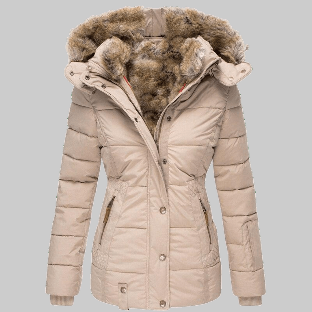 Vrouw draagt een stijlvolle dames winterjas met imitatiebont, warm en comfortabel voor een elegante uitstraling.