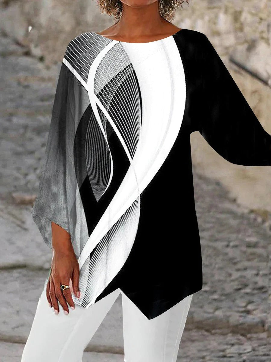 Elegante dames tuniek met abstract geometrisch design en lange mouwen. Veelzijdige, moderne top in zwart-wit voor dameskleding.