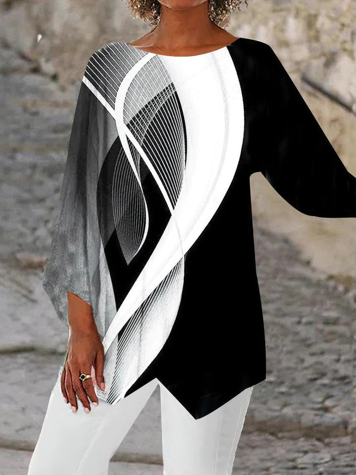 Elegante dames tuniek met abstract geometrisch design en lange mouwen. Veelzijdige, moderne top in zwart-wit voor dameskleding.