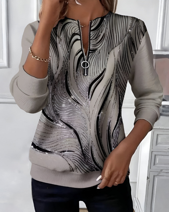 Comfortabele dames ritstrui met modern patroon. Grijze trui met lange mouwen, ideaal voor herfst/winter.