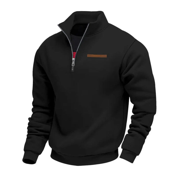 Een klassieke heren sweater met rits, gebreid voor extra warmte en een tijdloze uitstraling. Casual chic.